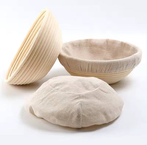 Natural round rattan sourdough proofing basket (banneton) with removable cotton liner for artisan bread baking, available in 20cm and 25cm